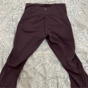 Lululemon size 6 purple cropped leggings with mesh